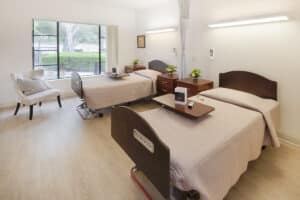 shared bedroom at sherwood oaks with large window and natural lighting